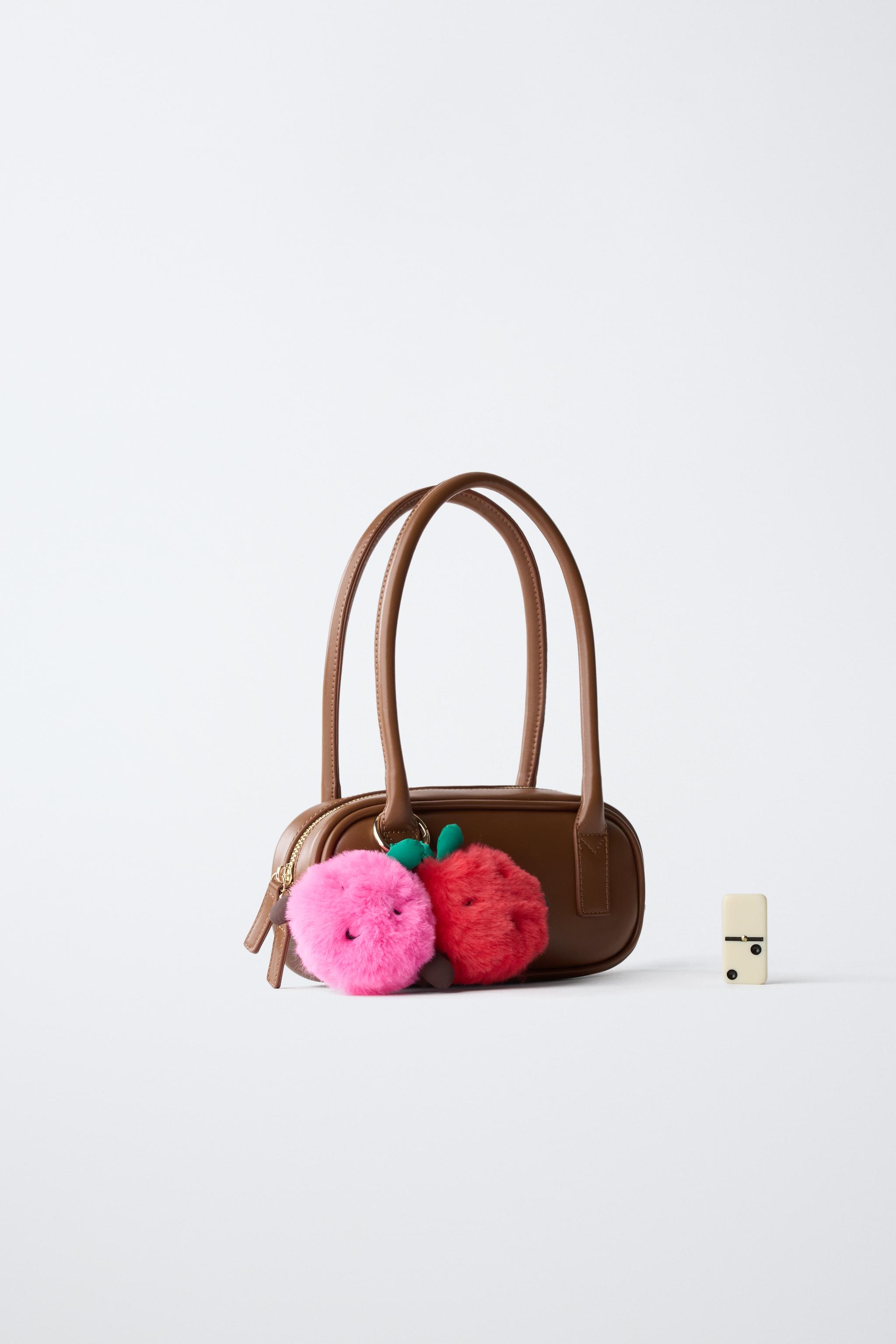 SAC À ÉPAULE POMPONS